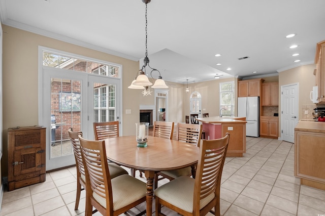 192 Berkshire Loop, Pawleys Island, SC 29585 - dining room with light tile patterned floors, crown molding, and recessed lighting