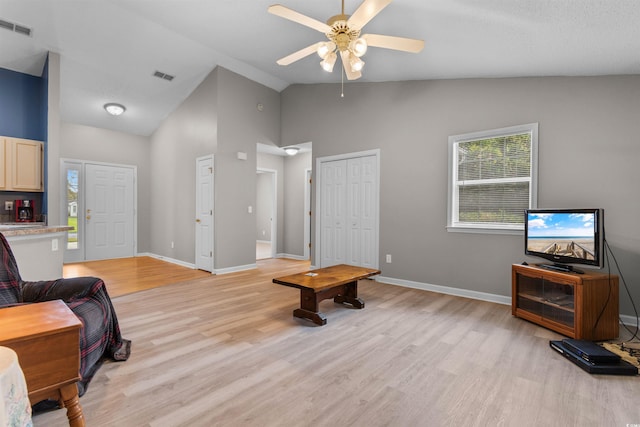 1202 Formby Ct, Myrtle Beach, SC 29588 - living area featuring visible vents, ceiling fan, light wood-style floors, and high vaulted ceiling