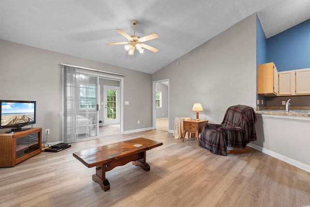 1202 Formby Ct, Myrtle Beach, SC 29588 - living area featuring baseboards, high vaulted ceiling, ceiling fan, and light wood-style floors