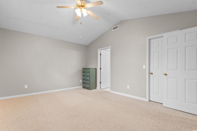 1202 Formby Ct, Myrtle Beach, SC 29588 - unfurnished bedroom with visible vents, vaulted ceiling, light carpet, and baseboards
