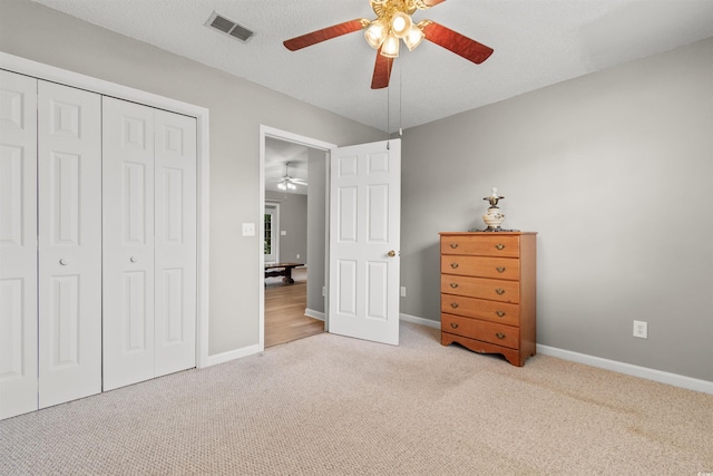 1202 Formby Ct, Myrtle Beach, SC 29588 - bedroom with visible vents, ceiling fan, a closet, baseboards, and carpet floors
