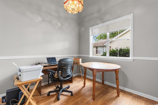 1202 Formby Ct, Myrtle Beach, SC 29588 - office area featuring wood finished floors, a notable chandelier, and baseboards