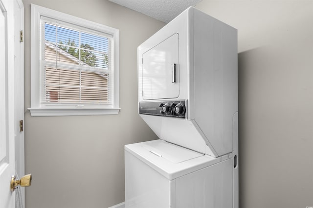 1202 Formby Ct, Myrtle Beach, SC 29588 - laundry room with stacked washer / dryer and baseboards