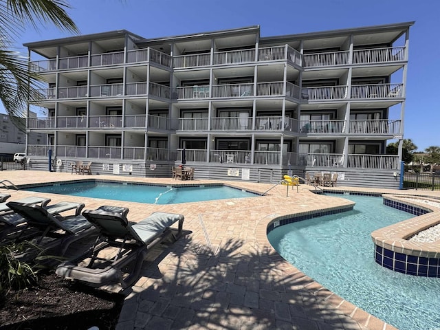 2001 S Ocean Blvd Unit 621, Myrtle Beach, SC 29577 - community pool featuring a patio area