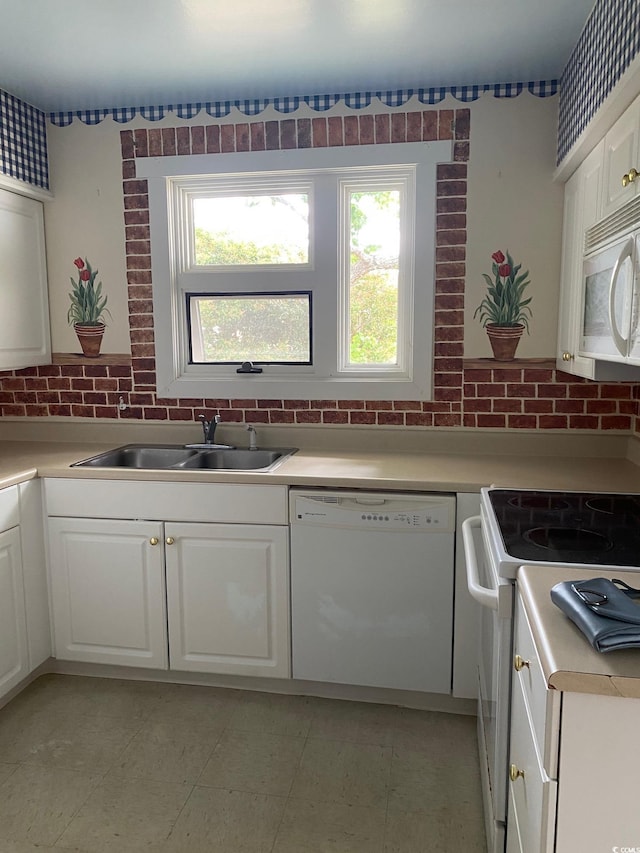 3752 Tea Rose St Unit 3752, Myrtle Beach, SC 29577 - kitchen featuring white appliances, a sink, plenty of natural light, and light countertops