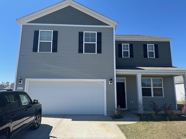 645 Black Pearl Way, Myrtle Beach, SC 29588 - view of front of property featuring a garage, driveway, a front lawn, and covered porch