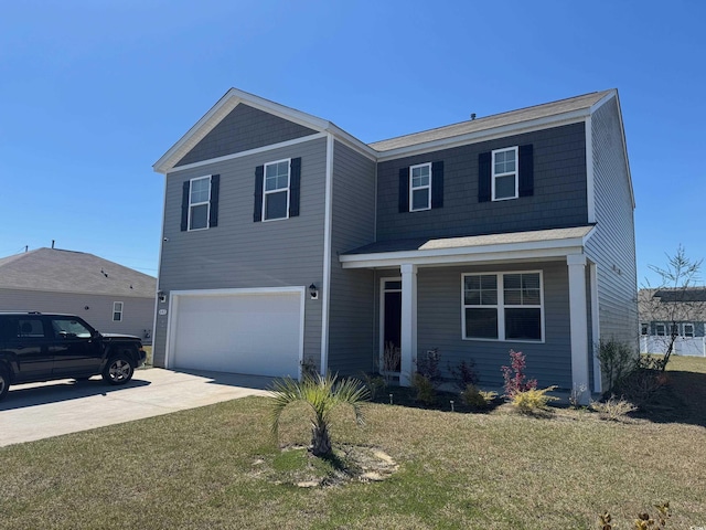 645 Black Pearl Way, Myrtle Beach, SC 29588 - traditional home with an attached garage, a front yard, driveway, and covered porch