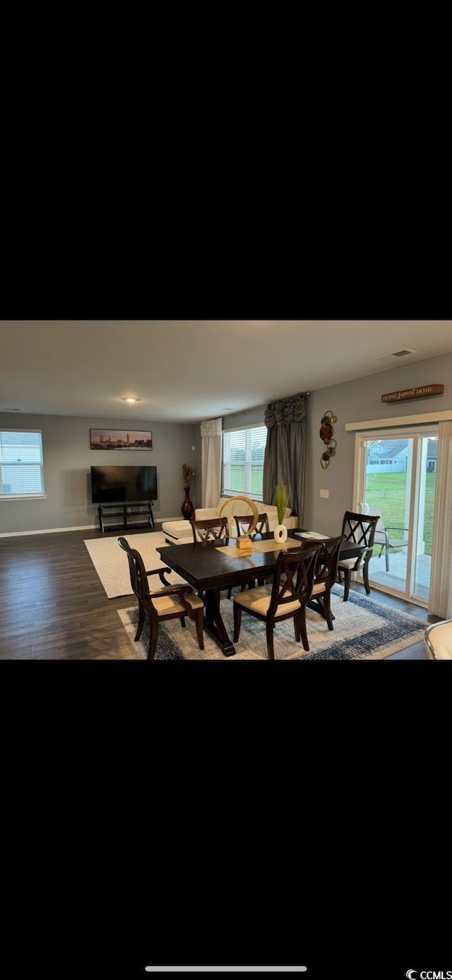645 Black Pearl Way, Myrtle Beach, SC 29588 - dining space with plenty of natural light and wood finished floors