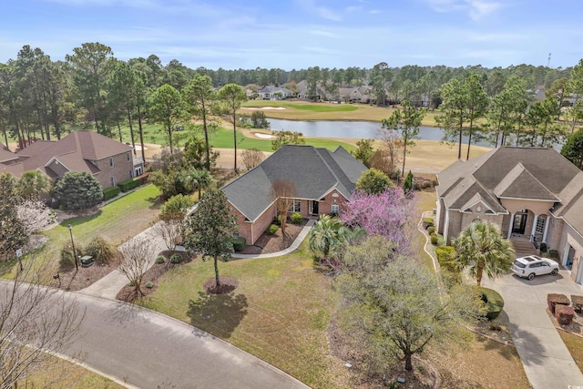 aerial view with a water view and a residential view