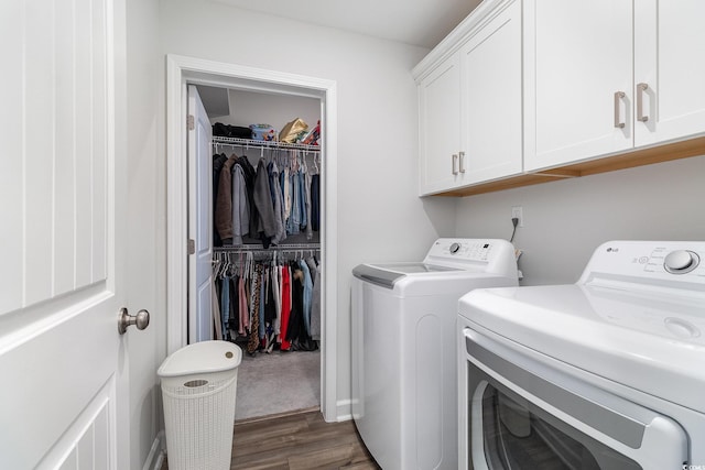 294 Portofino Dr, Myrtle Beach, SC 29579 - laundry room with washing machine and clothes dryer, cabinet space, and wood finished floors