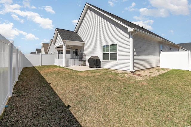 294 Portofino Dr, Myrtle Beach, SC 29579 - back of property featuring a patio and a fenced backyard
