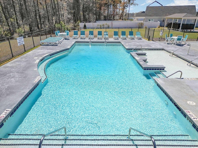 294 Portofino Dr, Myrtle Beach, SC 29579 - community pool with a patio and a hot tub