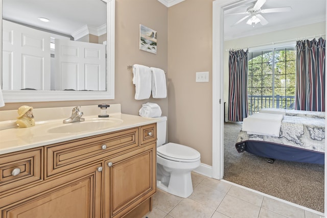 77 Tern Pl Unit 202, Pawleys Island, SC 29585 - bathroom with ornamental molding, vanity, tile patterned flooring, and a ceiling fan