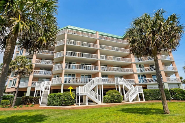 view of building exterior featuring stairs