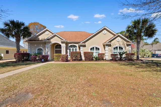 156 Henry Middleton Blvd, Myrtle Beach, SC 29588 - view of front of home with a front yard and stucco siding