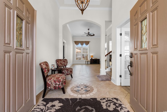 156 Henry Middleton Blvd, Myrtle Beach, SC 29588 - entryway with crown molding, stairs, light tile patterned flooring, baseboards, and arched walkways