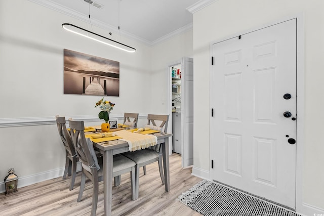2013 Silvercrest Dr Unit 30-F, Myrtle Beach, SC 29579 - dining space with ornamental molding, light wood-style floors, and baseboards