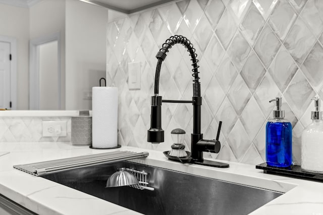 2013 Silvercrest Dr Unit 30-F, Myrtle Beach, SC 29579 - kitchen view of a sink, backsplash, and light stone countertops
