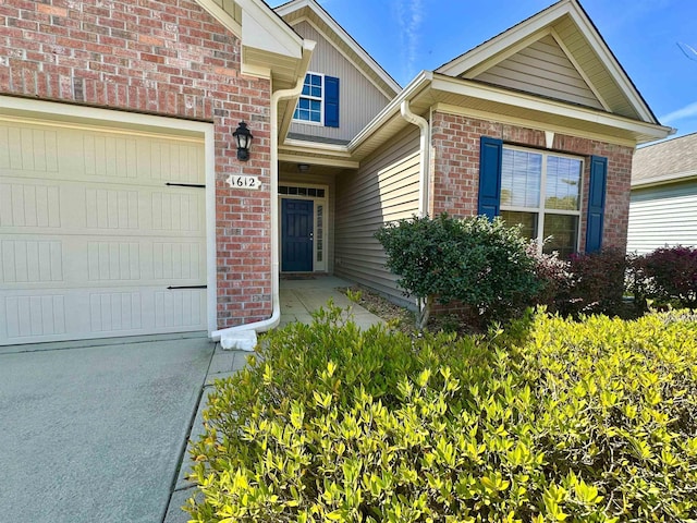 1612 Fairforest Ct, Conway, SC 29526 - property entrance featuring a garage and brick siding