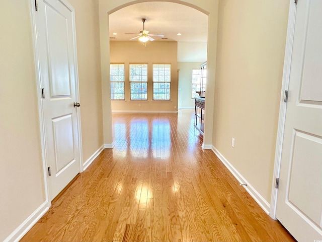 1612 Fairforest Ct, Conway, SC 29526 - corridor featuring arched walkways, light wood finished floors, and recessed lighting