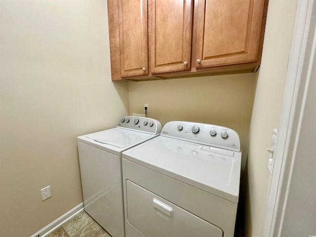 1612 Fairforest Ct, Conway, SC 29526 - laundry room featuring washer and dryer, cabinet space, and tile patterned flooring