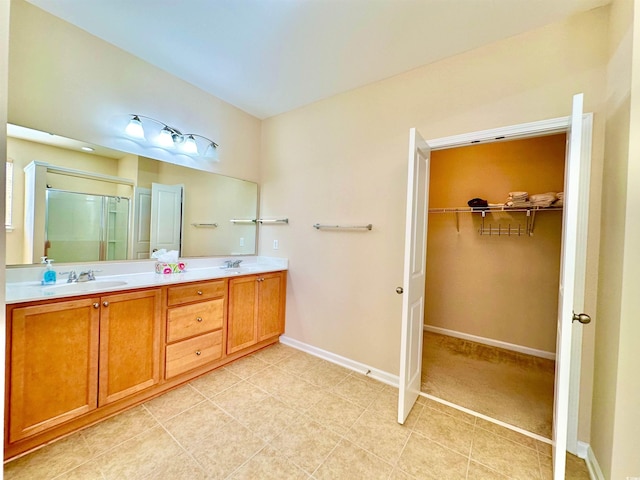 1612 Fairforest Ct, Conway, SC 29526 - full bath featuring a stall shower, double vanity, and a walk in closet
