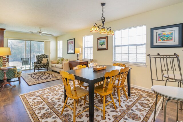 478 Pinehurst Ln Unit 17D, Pawleys Island, SC 29585 - dining space with wood finished floors, a ceiling fan, and baseboards