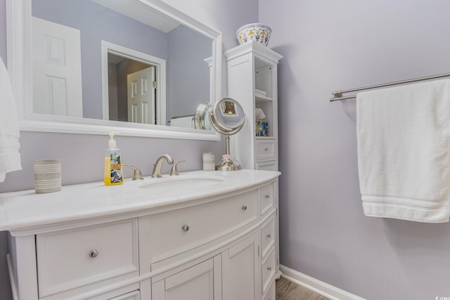 478 Pinehurst Ln Unit 17D, Pawleys Island, SC 29585 - bathroom with vanity, baseboards, and wood finished floors