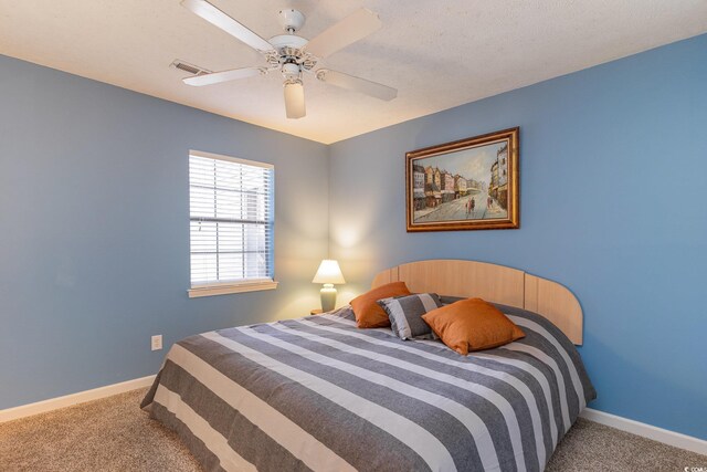 478 Pinehurst Ln Unit 17D, Pawleys Island, SC 29585 - bedroom with carpet flooring, baseboards, and ceiling fan