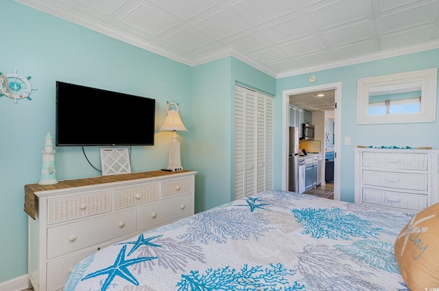 2001 S Ocean Blvd Unit 1505, Myrtle Beach, SC 29577 - bedroom with a closet, freestanding refrigerator, baseboards, and an ornate ceiling