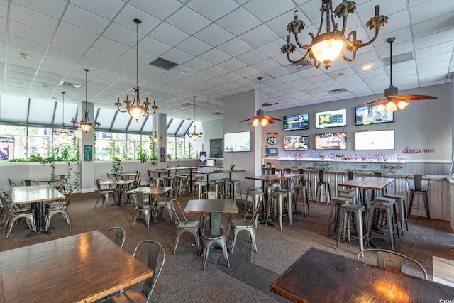 2001 S Ocean Blvd Unit 1505, Myrtle Beach, SC 29577 - carpeted dining room featuring a drop ceiling, a ceiling fan, and a wealth of natural light