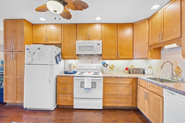 5601 N Ocean Blvd Unit C-311, Myrtle Beach, SC 29577 - kitchen with light countertops, white appliances, dark wood-type flooring, a sink, and a ceiling fan
