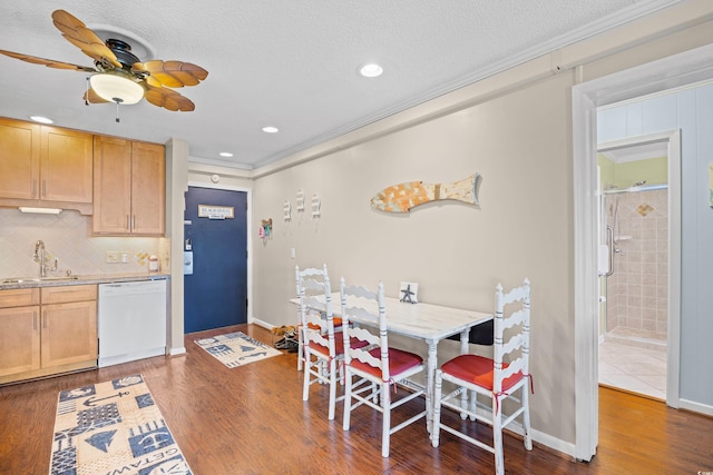 5601 N Ocean Blvd Unit C-311, Myrtle Beach, SC 29577 - dining area with wood finished floors, a textured ceiling, baseboards, ceiling fan, and ornamental molding