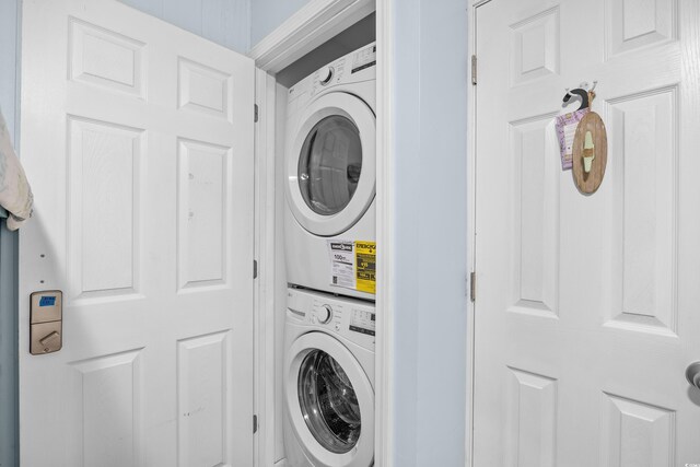 5601 N Ocean Blvd Unit C-311, Myrtle Beach, SC 29577 - laundry room featuring stacked washer and dryer and laundry area