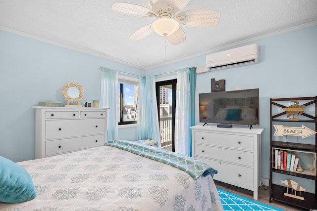 5601 N Ocean Blvd Unit C-311, Myrtle Beach, SC 29577 - bedroom with ornamental molding, access to outside, a textured ceiling, a wall mounted air conditioner, and wood finished floors