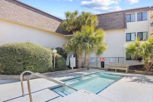 5601 N Ocean Blvd Unit C-311, Myrtle Beach, SC 29577 - view of swimming pool featuring fence and a pool