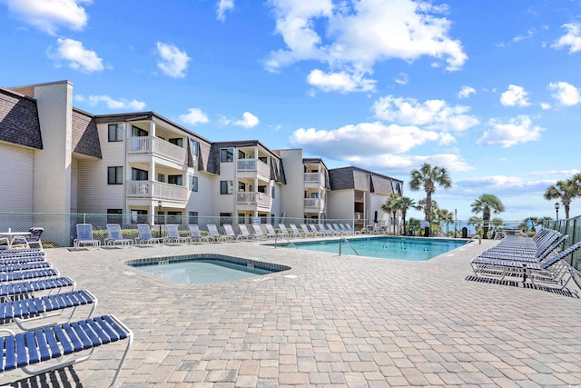 5601 N Ocean Blvd Unit C-311, Myrtle Beach, SC 29577 - pool with fence and a patio area