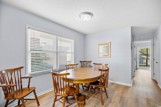 600-B 43rd Ave S, North Myrtle Beach, SC 29582 - dining area with a textured ceiling and wood finished floors