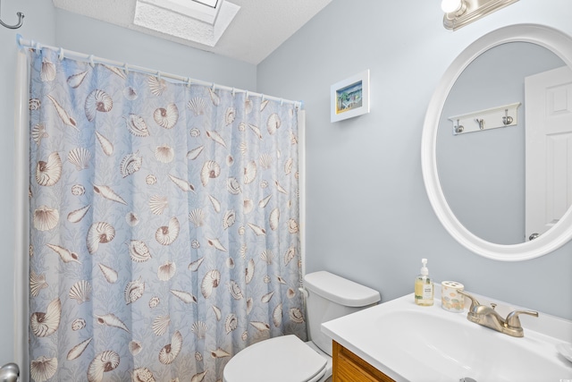 600-B 43rd Ave S, North Myrtle Beach, SC 29582 - bathroom featuring a skylight, vanity, and a shower with curtain