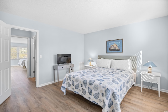 600-B 43rd Ave S, North Myrtle Beach, SC 29582 - bedroom with wood finished floors