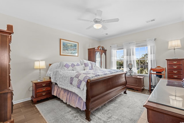100 Marblehead Dr, Little River, SC 29566 - bedroom featuring crown molding, baseboards, ceiling fan, and wood finished floors