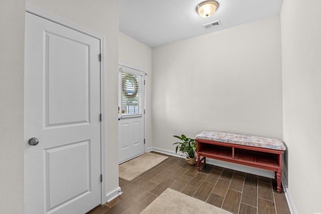 100 Marblehead Dr, Little River, SC 29566 - doorway with wood tiled floors and baseboards