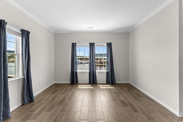 100 Marblehead Dr, Little River, SC 29566 - spare room featuring healthy amount of natural light, dark wood-style floors, and crown molding