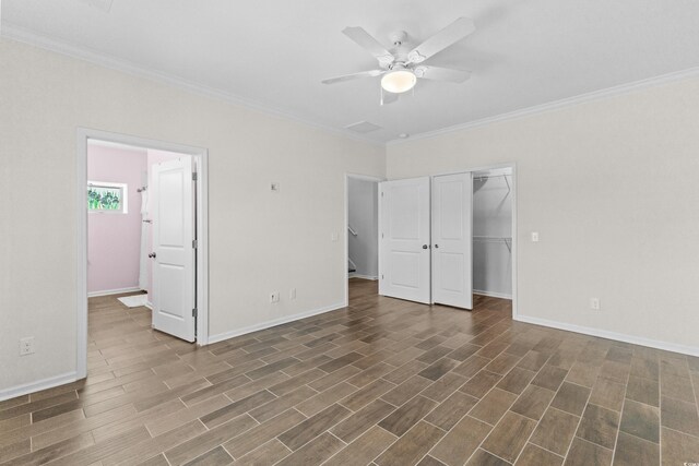100 Marblehead Dr, Little River, SC 29566 - unfurnished bedroom with ornamental molding, dark wood finished floors, a closet, and ceiling fan