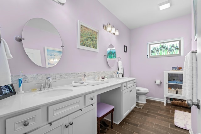 100 Marblehead Dr, Little River, SC 29566 - full bathroom with toilet, double vanity, and wood finished floors