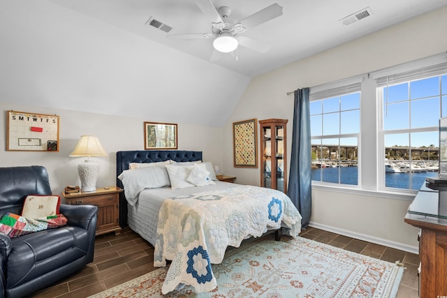 100 Marblehead Dr, Little River, SC 29566 - bedroom featuring wood tiled floors, vaulted ceiling, a ceiling fan, a water view, and baseboards