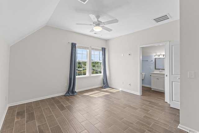100 Marblehead Dr, Little River, SC 29566 - unfurnished bedroom with wood finished floors, lofted ceiling, a ceiling fan, and connected bathroom
