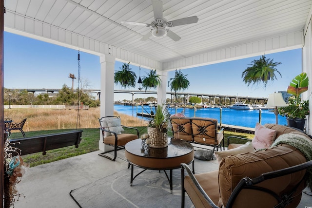 100 Marblehead Dr, Little River, SC 29566 - view of patio / terrace with a water view, outdoor lounge area, and a ceiling fan