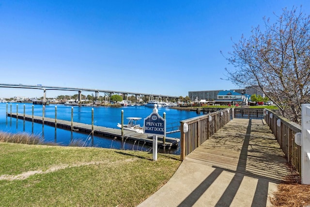 100 Marblehead Dr, Little River, SC 29566 - dock with a water view and a lawn