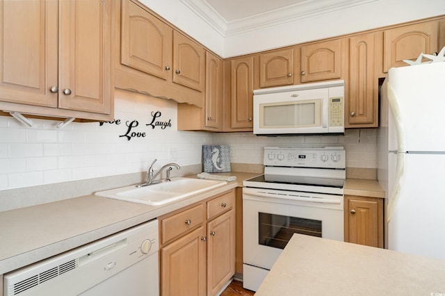 kitchen with light countertops, crown molding, white appliances, decorative backsplash, and a sink